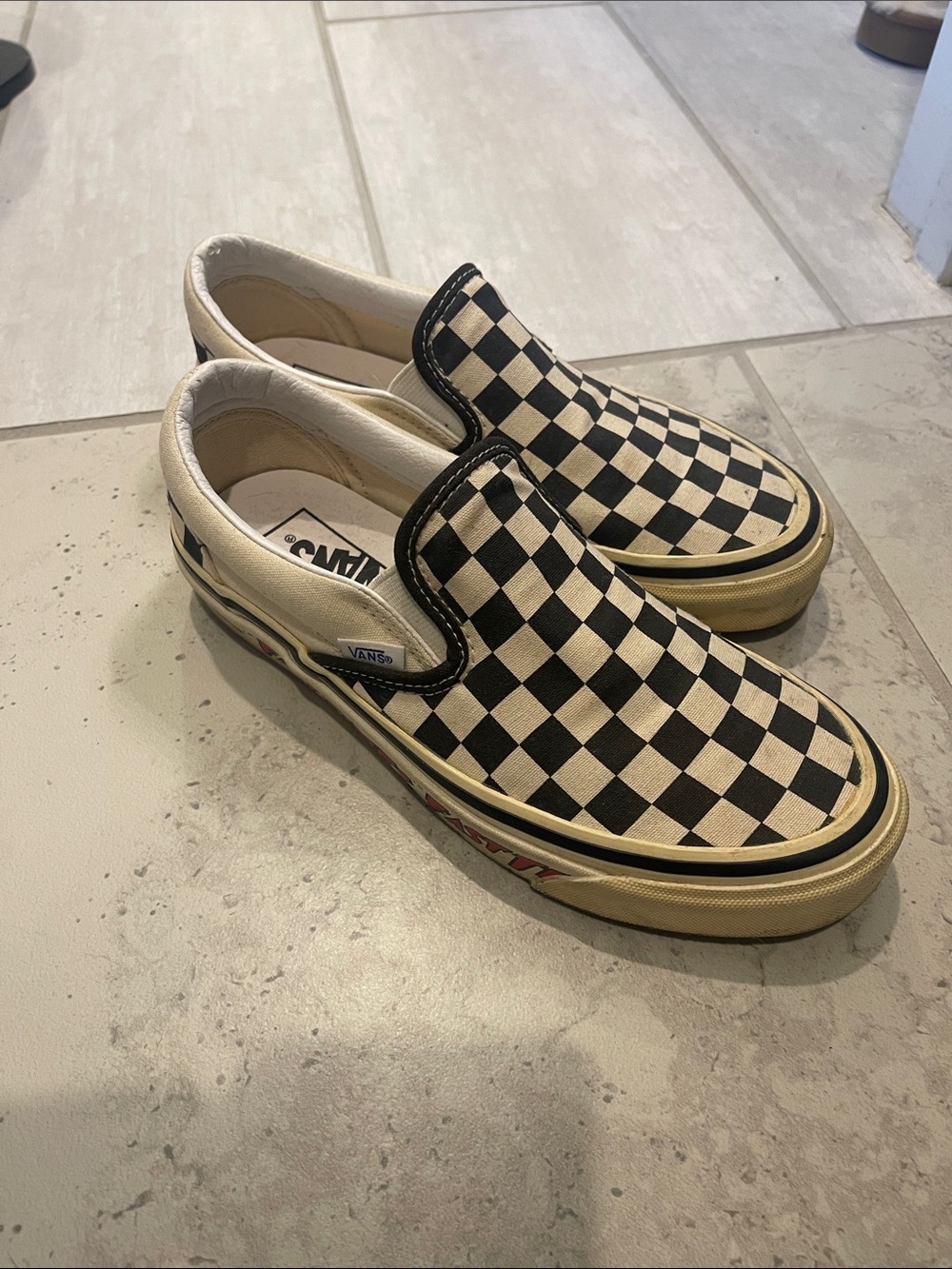 Vans Checkerboard Slip-On Sneakers - Black & Cream with Red Side Graphic